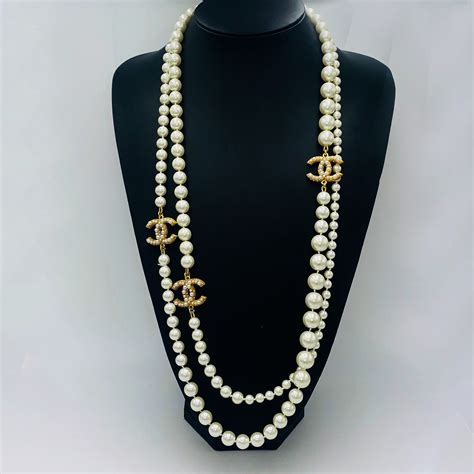 chanel gold necklace vintage|Chanel classic long pearl necklace.